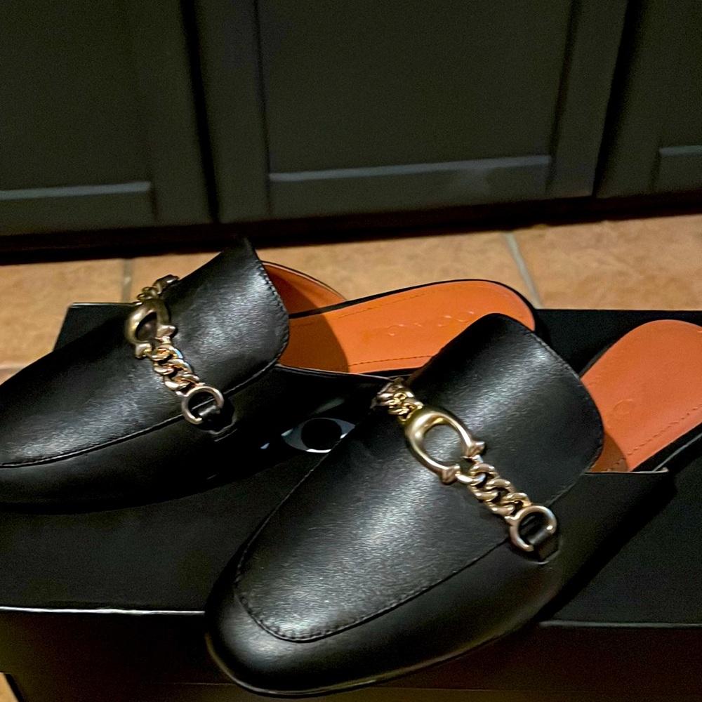 Brand new Coach flats . Size 5